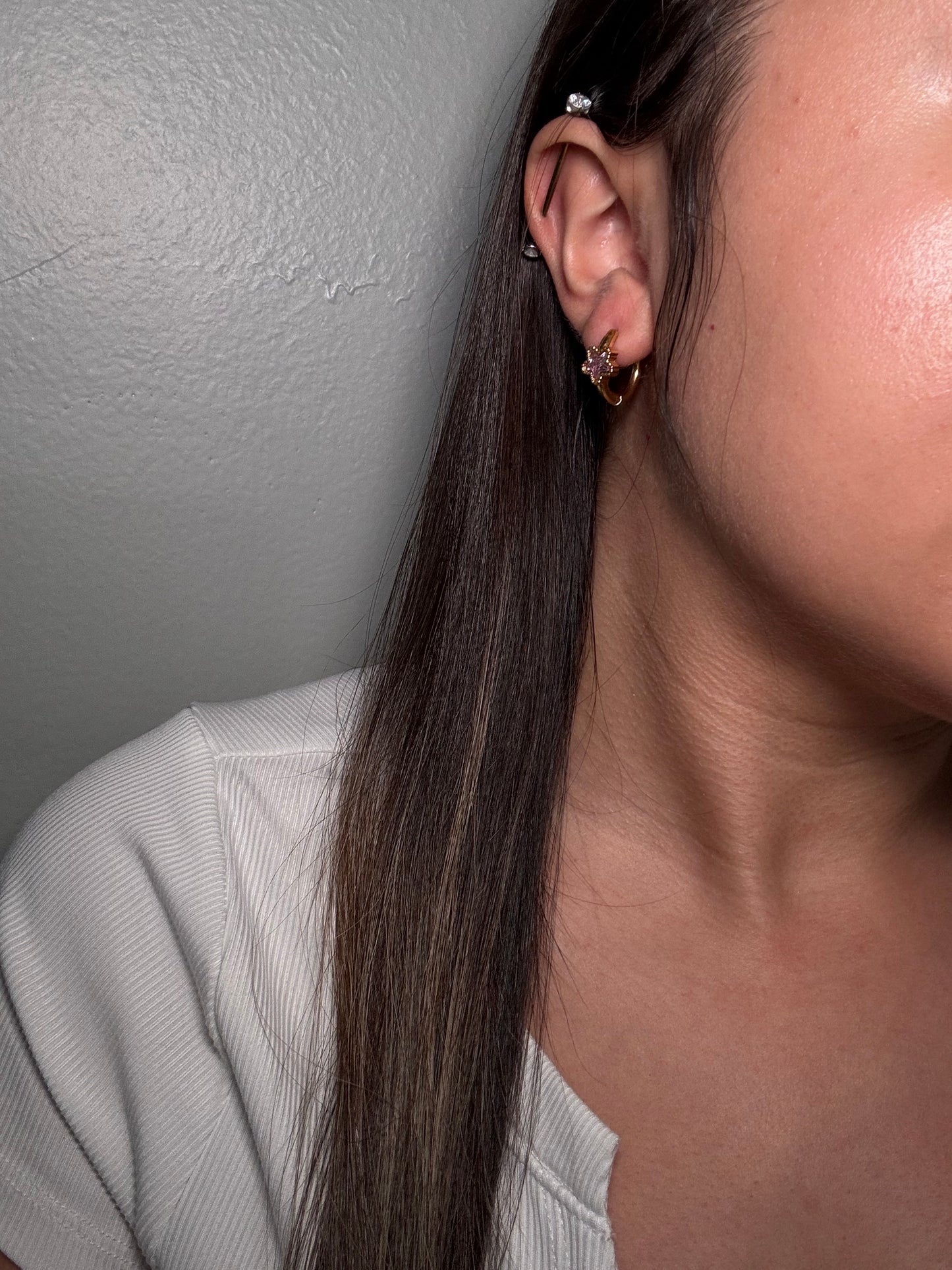 The Aubergine Hoops worn by model close-ups on ear for scale and stylng reference.
