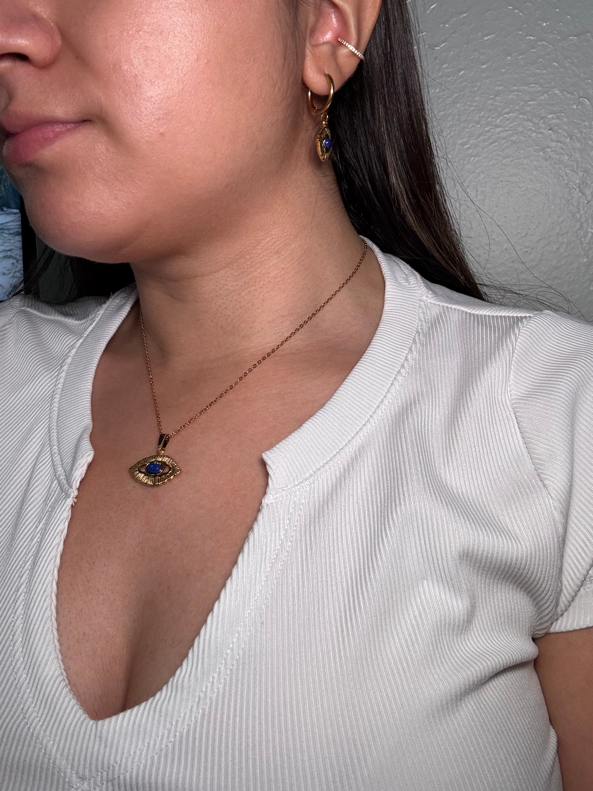 Close-up of model with Orovie necklace styled for everyday wear.