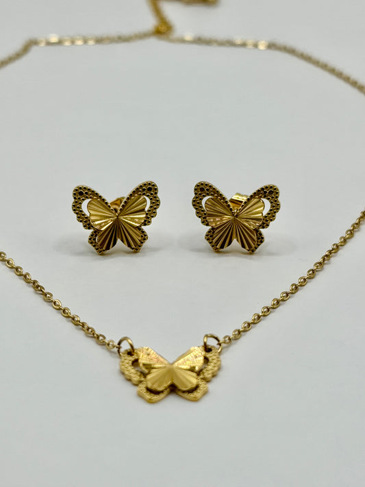 Gold butterfly stud earrings and matching necklace displayed on white background.