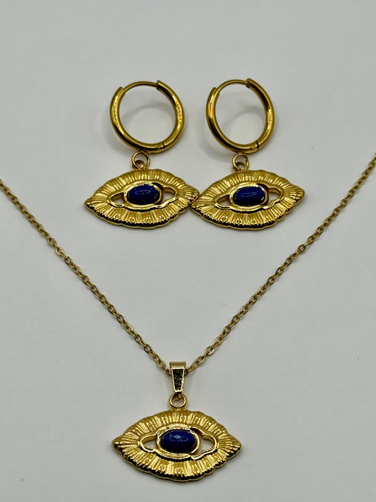 EMPIECE™ Orovie Set flat lay: gold and cobalt blue eye motif necklace with matching earrings.