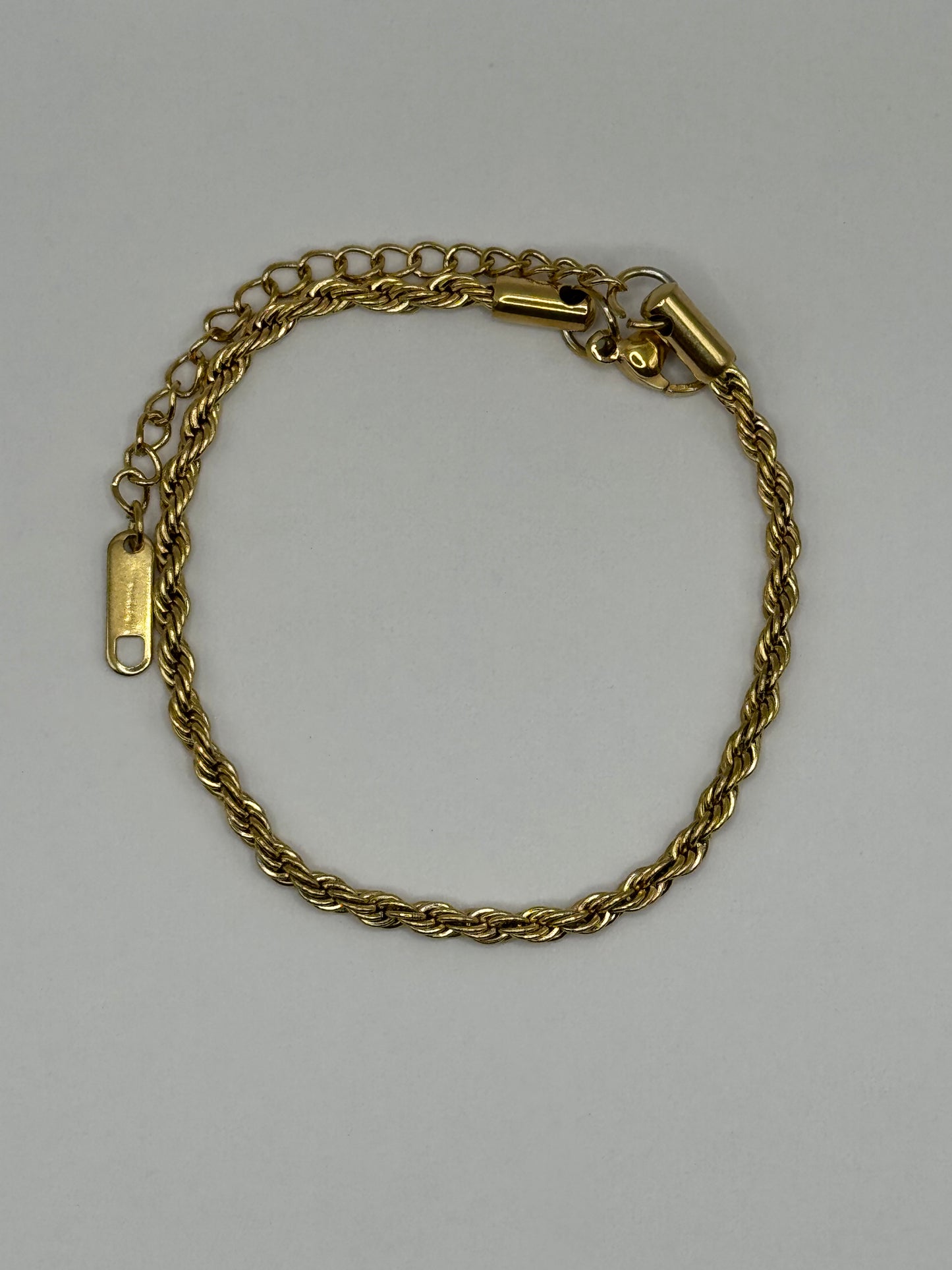 Gold 3mm rope chain bracelet, The Livara Bracelet displayed in a circular arrangement.
