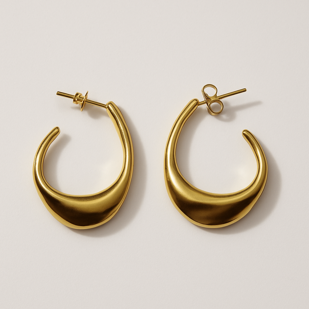 Pair of sculptural gold C-shaped hoop stud earrings, The Virelle Earrings by EMPIECE™.