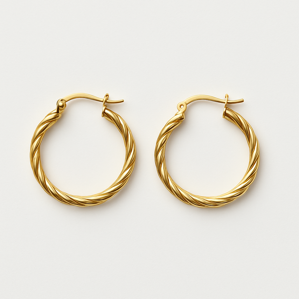 Front view of The Cinta Twist gold hoop earrings by EMPIECE™, featuring elegant interlacing curves in a polished gold-tone finish.