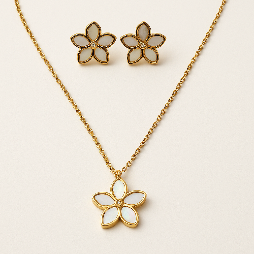 The Opalina Set necklace and matching floral stud earrings displayed flat on white background with gold and enamel finish.