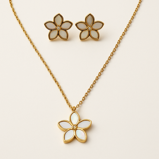The Opalina Set necklace and matching floral stud earrings displayed flat on white background with gold and enamel finish.