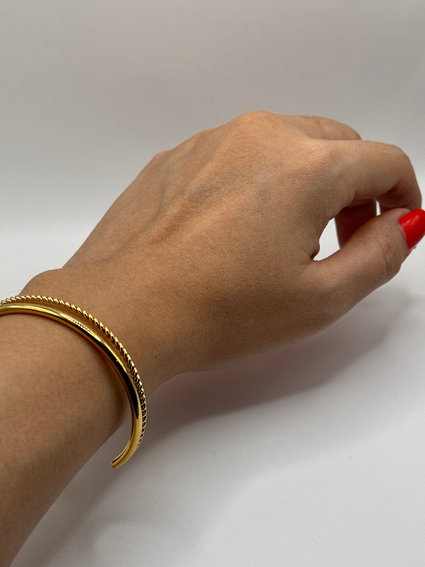 Orion Bracelet worn on a wrist, demonstrating its refined ridged detail and everyday versatility. 