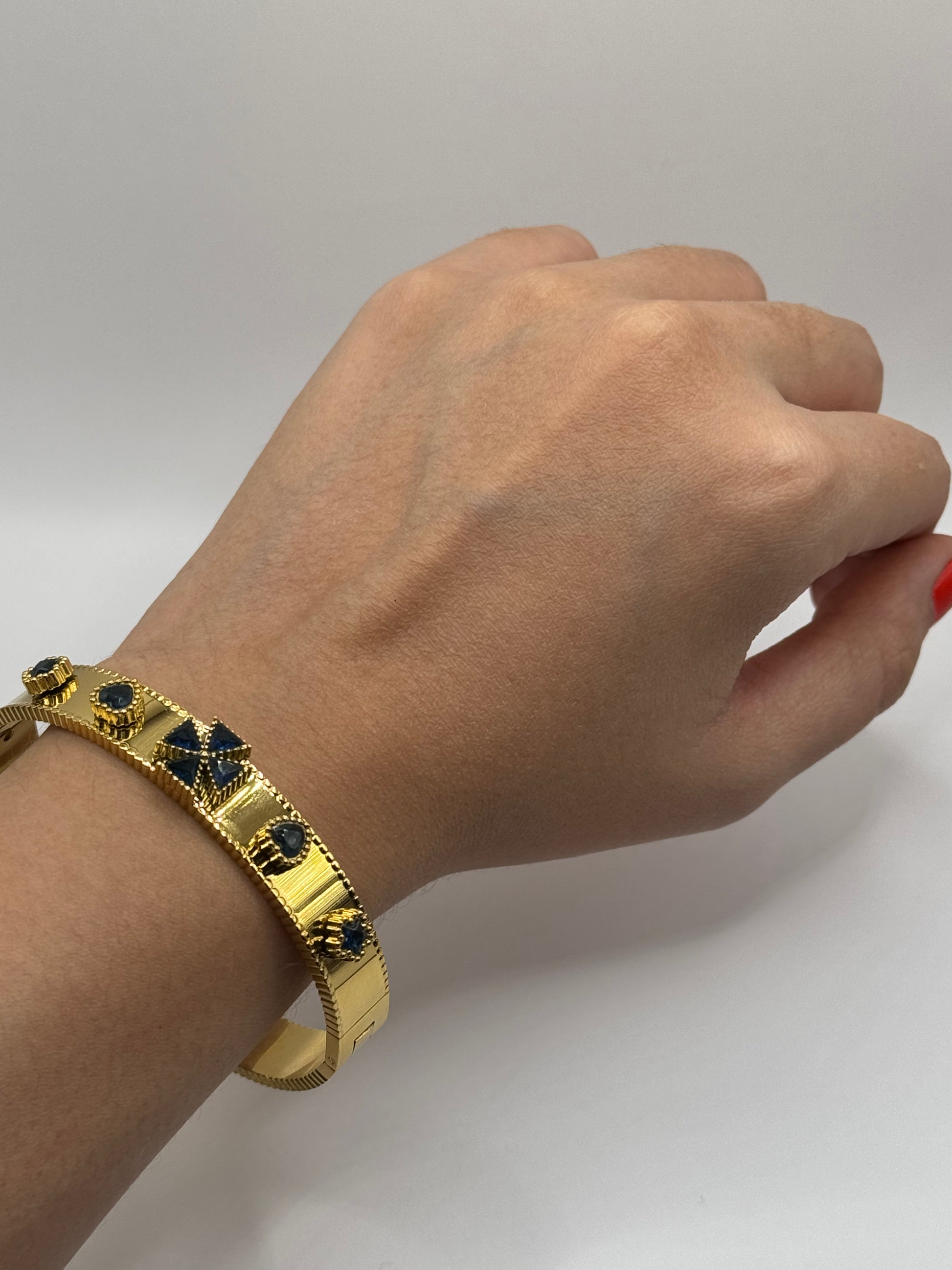 Model wearing The Noctara Bracelet, styled on wrist to show celestial-inspired design.