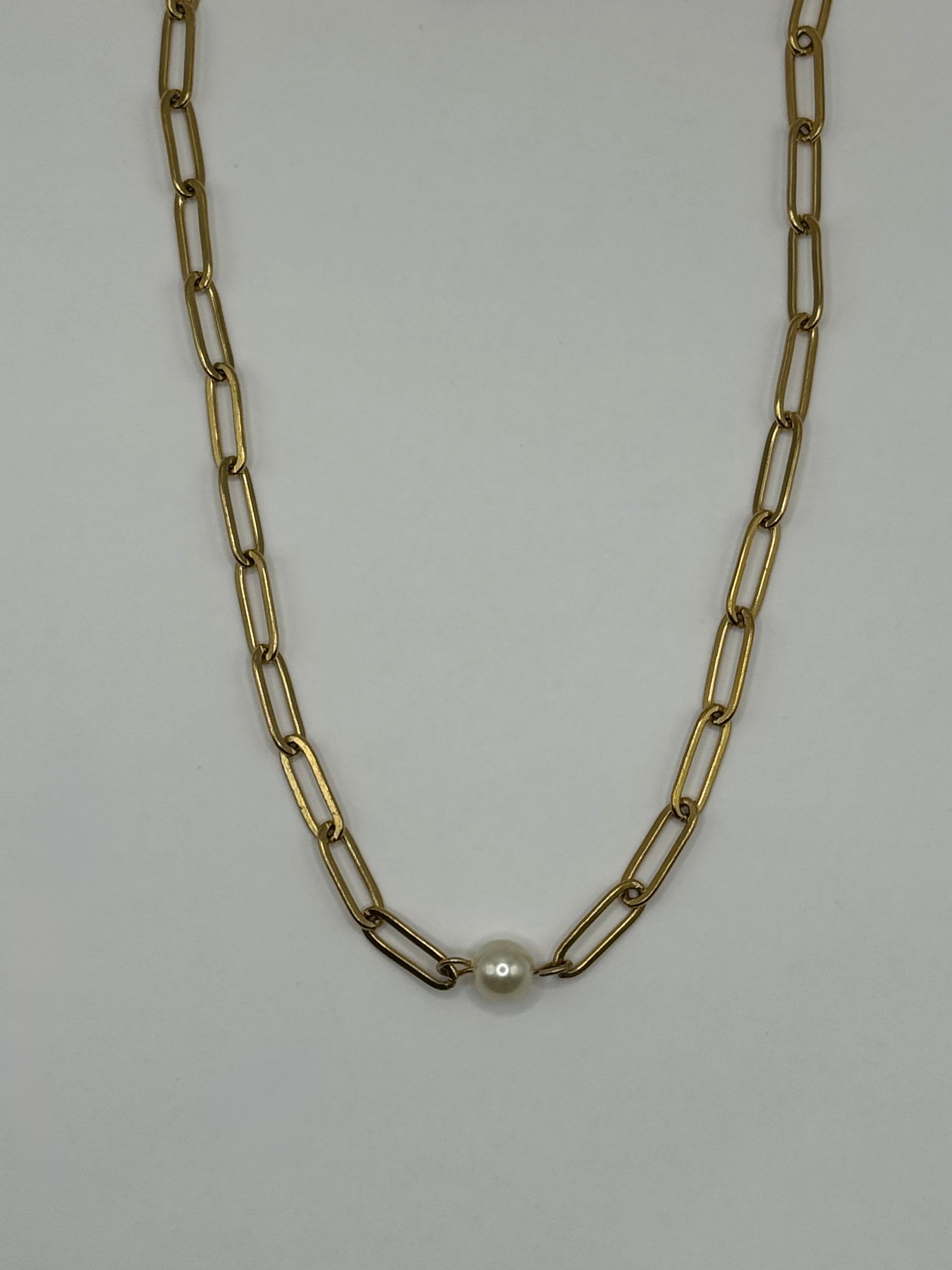Gold paperclip chain necklace with single pearl accent centered on white background, The Margaux Necklace by EMPIECE™.